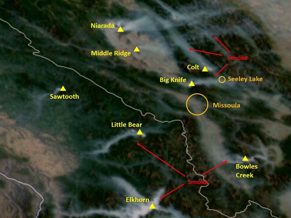A satellite photo showing fires and smoke plumes across Western Montana and Idaho