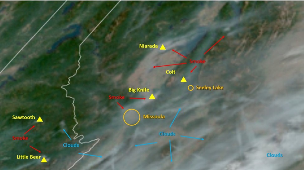 A satellite photo showing smoke and clouds over Western Montana
